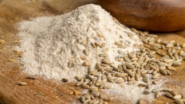 Wholemeal flour pile on table